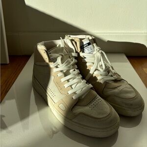 Men’s white and cream high top Axel Arigato sneakers